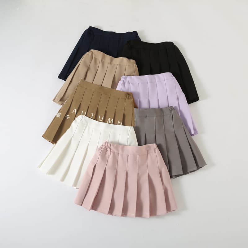 Children's pleated A-line skirt, short skirt, autumn and winter school style, 2023 performance costume, versatile skirt, solid color girls' skirt.