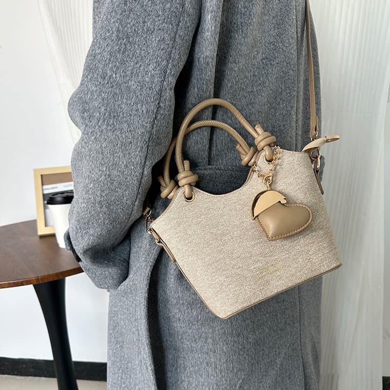 Cross-border simple large-capacity handbag for women 2026 new high-end single shoulder crossbody bag commuter bucket bag wholesale