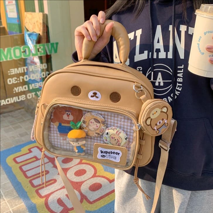 Japanese cute cartoon bear backpack two-dimensional transparent bar and millet bag large capacity portable backpack for girls