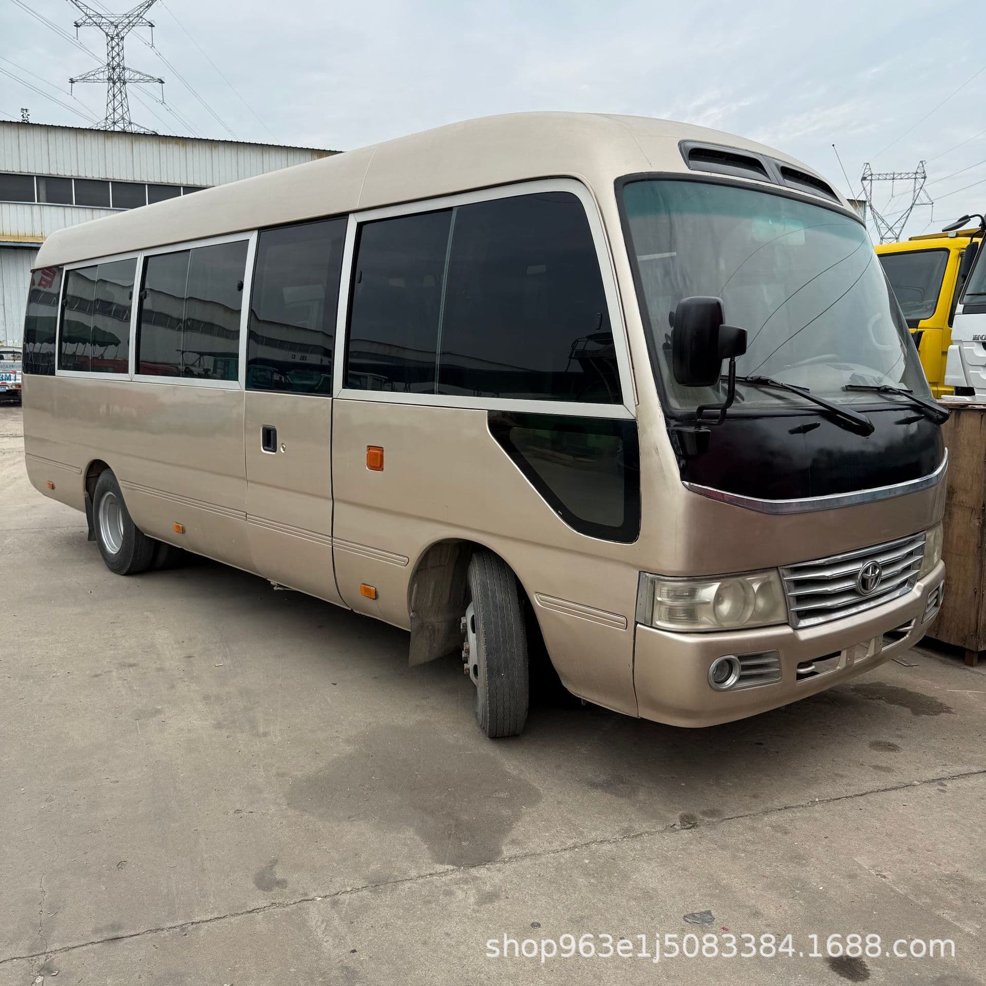 Cross-border export premium luxury bus 4-cylinder Toyota, Coaster 19-23 seats, 8-meter Euro III emission medium bus