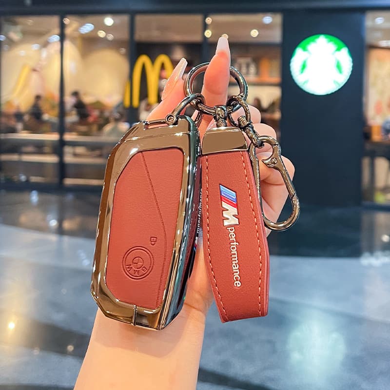 Suitable for BMW key cover x5 x4 blade x3X2X1 buckle 5/3 series i3 shell 525/325/530li car x6 bag