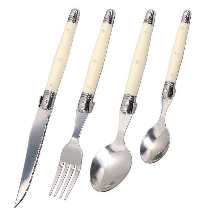 Stainless steel household knife, fork, spoon and broth set; off-white plastic handle; steak knife, steak fork, spoon; steak; Western food.