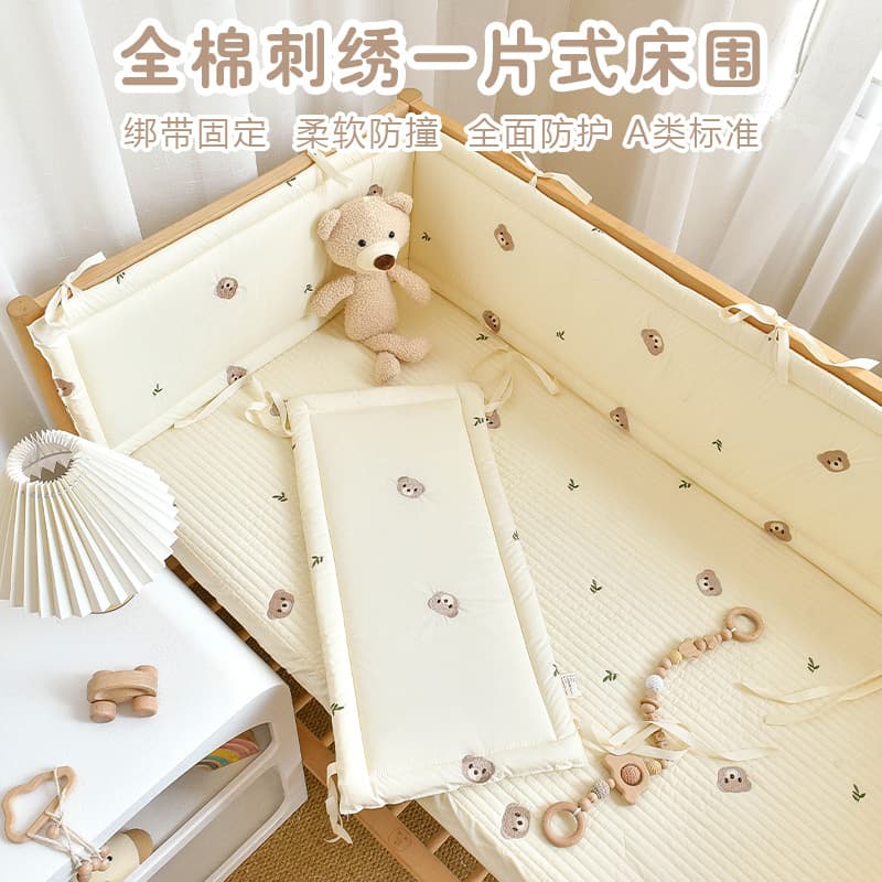 Baby crib bumper with pure cotton design, cartoon embroidery, soft cushioning, anti-collision strips, and anti-fall guardrail.
