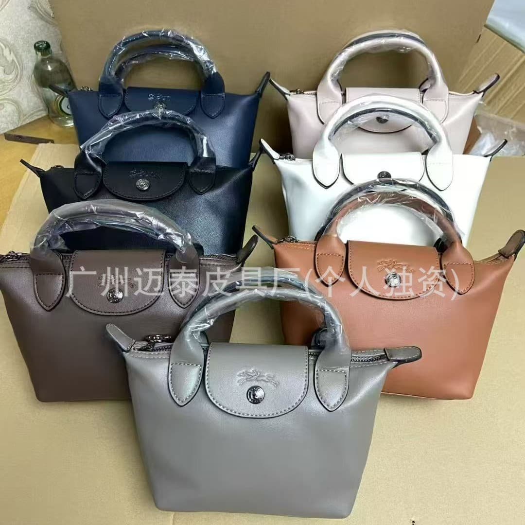 Longxiang purchasing grade cross-border Tunisian first-layer cowhide mini dumpling bag women's hand-held crossbody bag single fashion