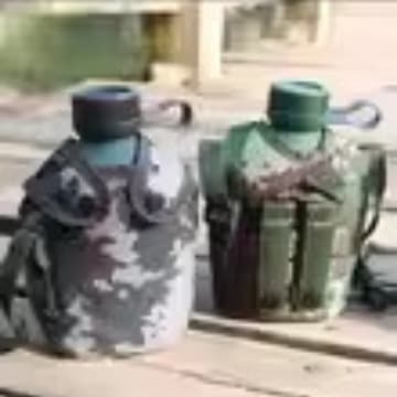 Wholesale lot of 10 portable camouflage aluminum outdoor water bottles for military training, hiking, camping, and sports