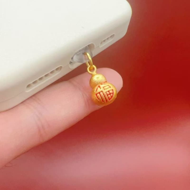 Drip oil sand gold New Year hit mini abacus, new flat panel design, universal dust plug for Apple/Android earphones.