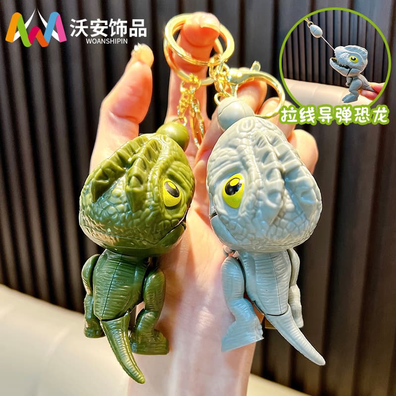 Pull string dinosaur keychain teething dinosaur keychain creative portable toys small gifts school bag pendant wholesale