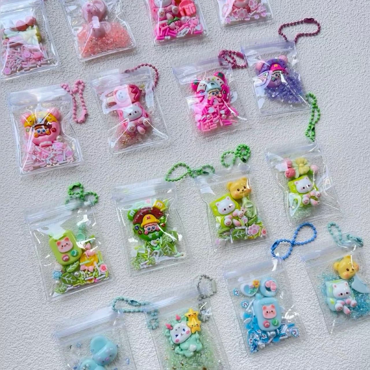 Cartoon baby stroller bag, transparent and thickened keychain, cute puppy bag charm, mobile phone ornament, student wholesale, live streaming.