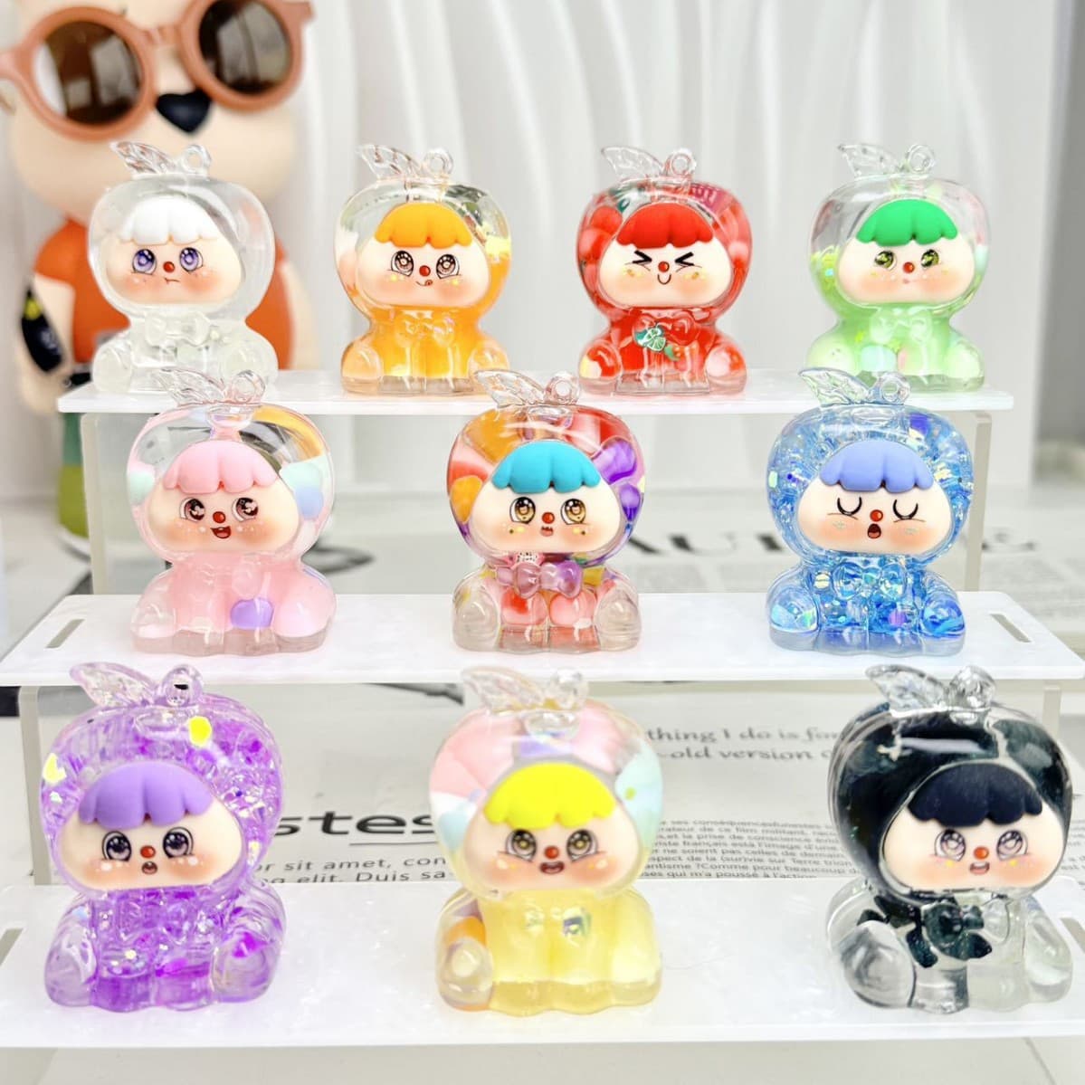 Douyin Viral Fruit Baby Apple Hourglass Oil-Filled Large Milk Bean Flash Keychain Small Ornament Blind Bag Wholesale