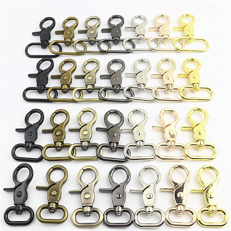 Handbag strap hook and light gold key ring, large pliers buckle, dog hook and fastener connector.