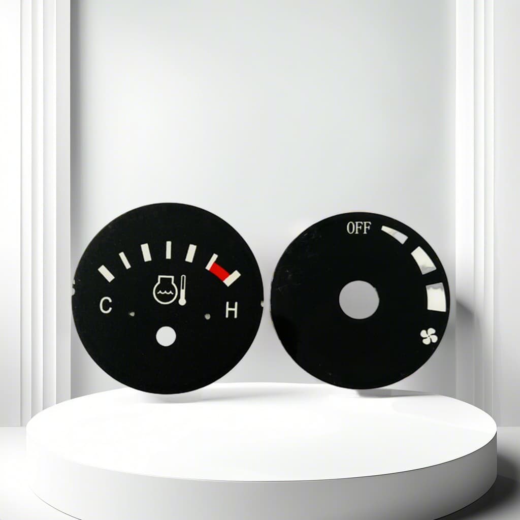 Vehicle instrument dial film overlays, automotive heater control panels, interior air conditioning adjustment switches