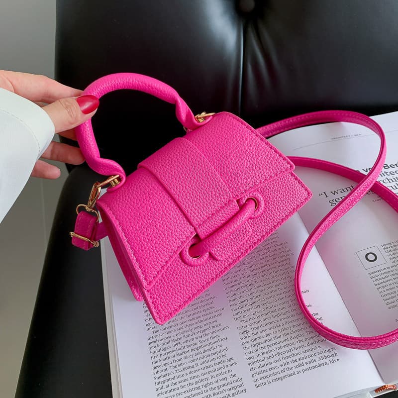 Hand-held candy-colored texture cross-body bag, versatile and niche mini coin lipstick pink shell bag