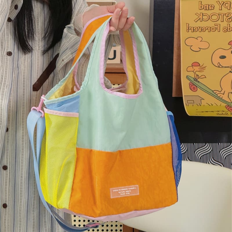 Dopamine color-blocked tote bag, high-looking niche folding canvas bag, lightweight contrasting color versatile student handbag for women