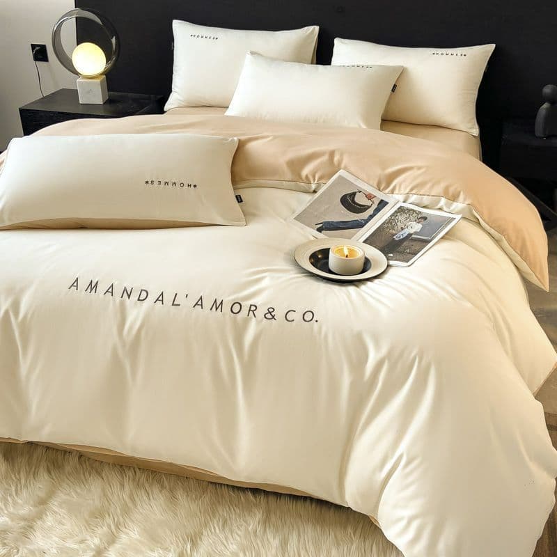 Luxury style washed cotton four-piece bedding set, solid color brushed embroidery duvet cover, sheet, fitted sheet, dormitory three-piece set wholesale