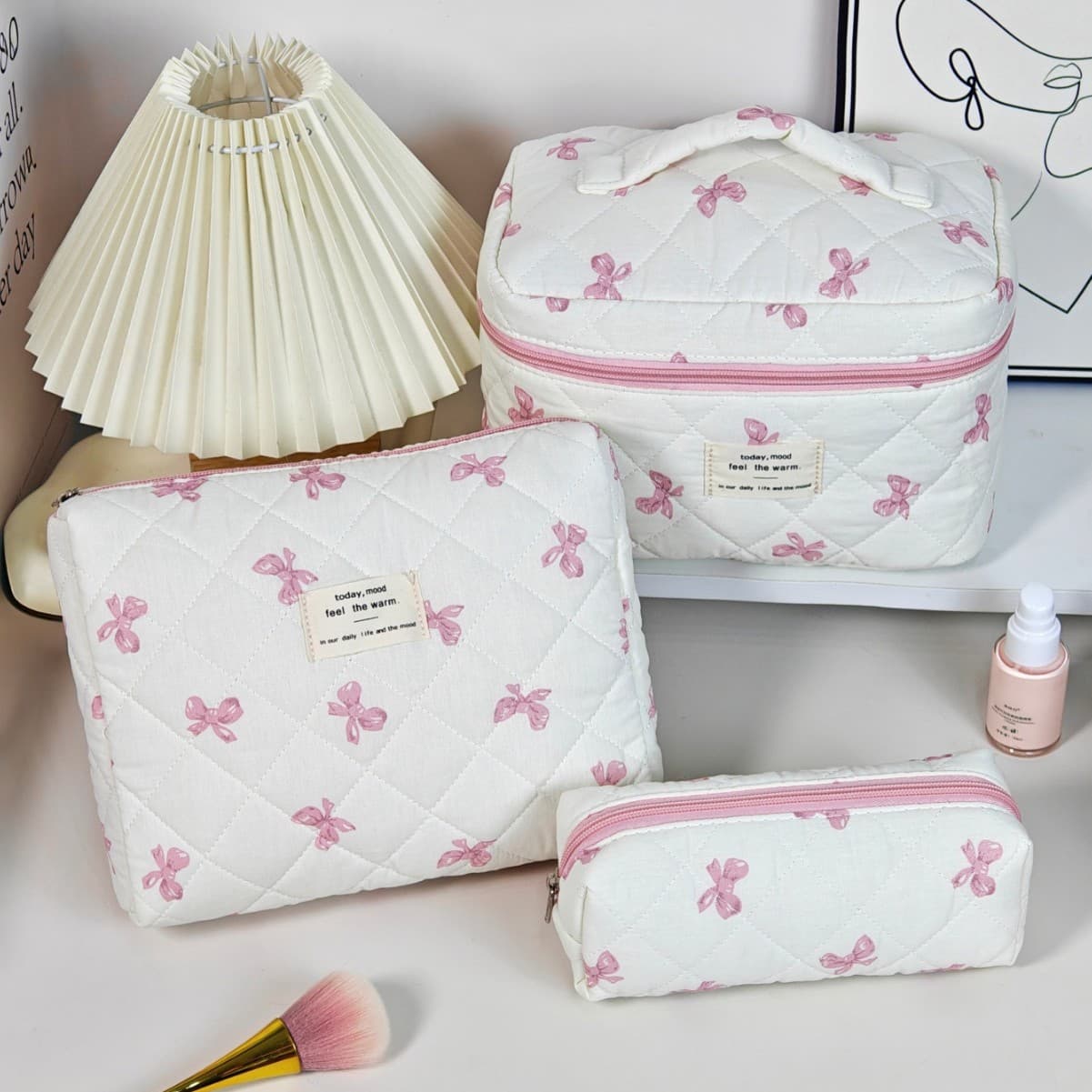 Fresh and bow-tie cosmetic bag, large-capacity polycotton storage, high-end ins portable makeup and toiletry storage bag