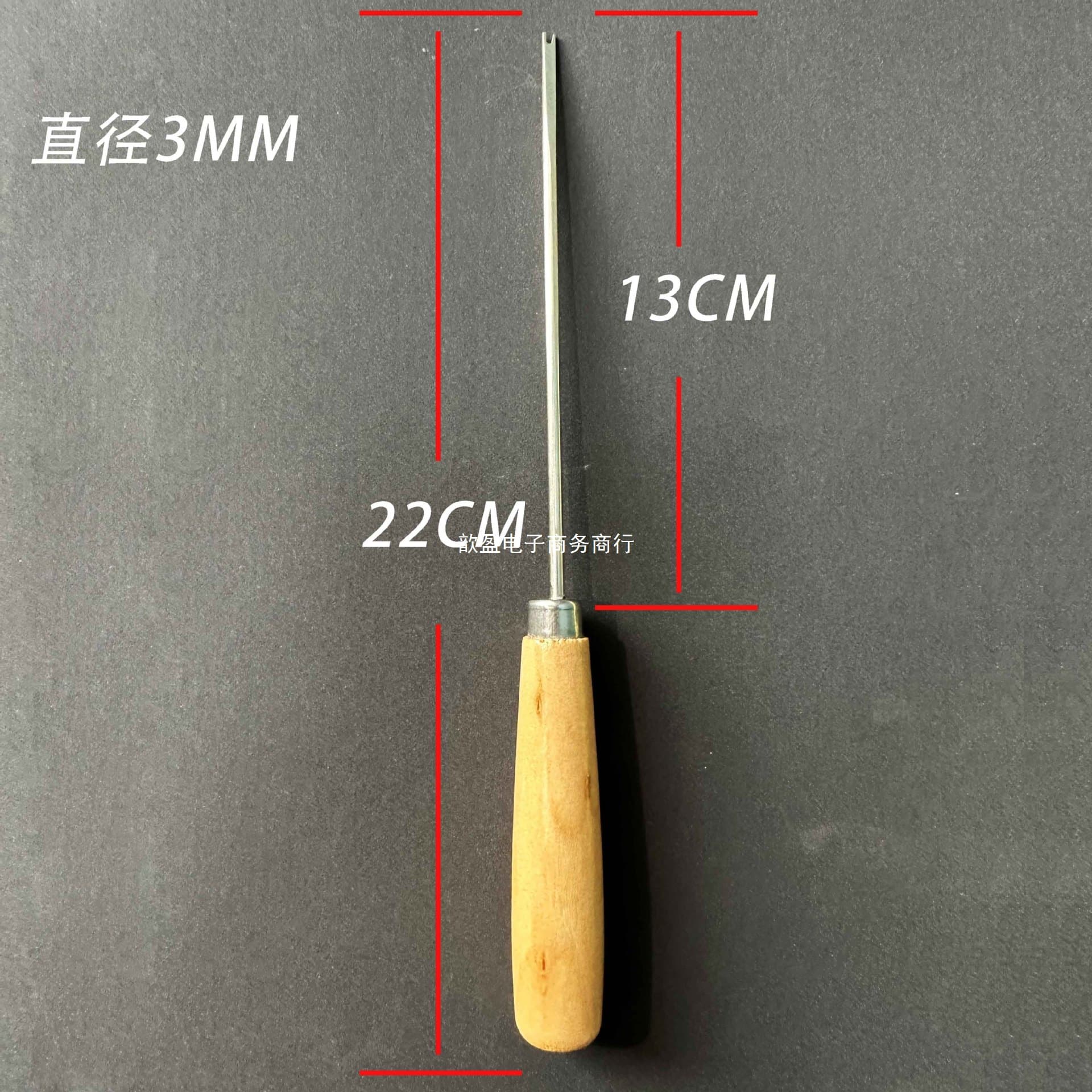 Handheld stuffing stick with handle for plush doll making tools.