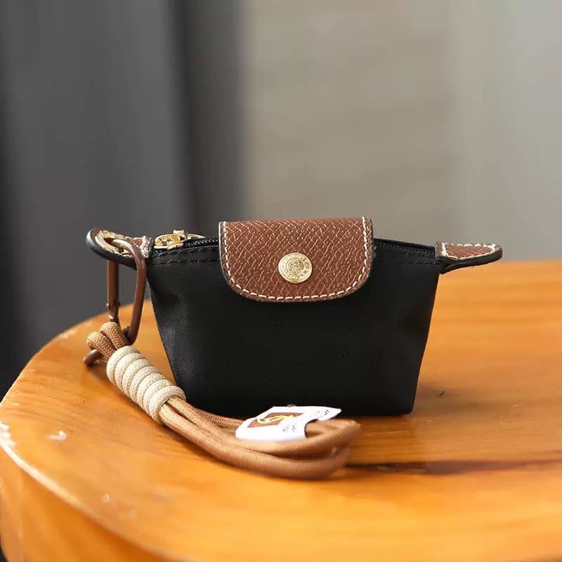 Guangzhou factory direct sales dragon inlaid bag mini dumpling bag creative color matching coin lipstick bag headphone bag portable small hanging
