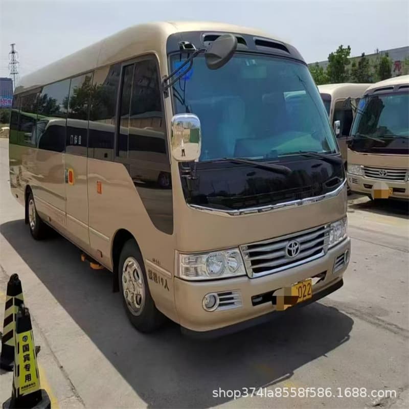Wholesale Toyota Coaster buses, exportable mid-sized buses with 19-23 seats, electric doors, and Hiace minibuses.