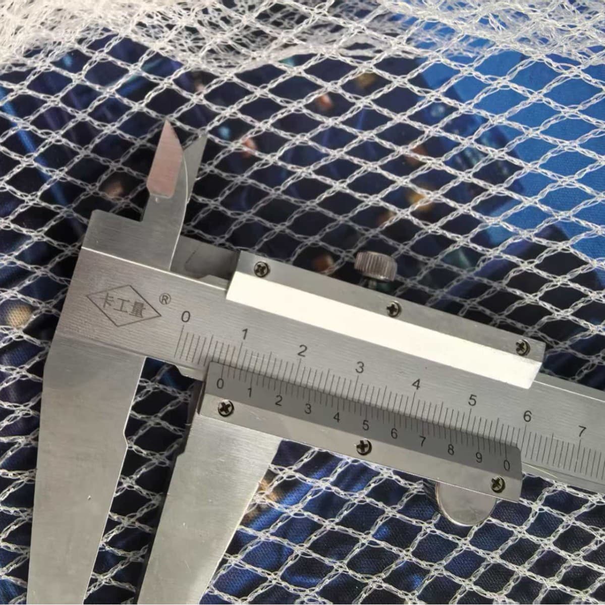 White hail net for apple orchards, vineyards, farmland, flower gardens, and farms.