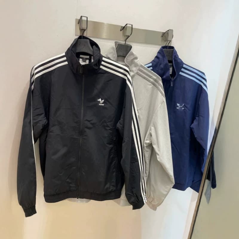 Cross-border spring and autumn classic three-stripes men's and women's trendy sports jackets stand-up collar long-sleeved couple embroidered jackets