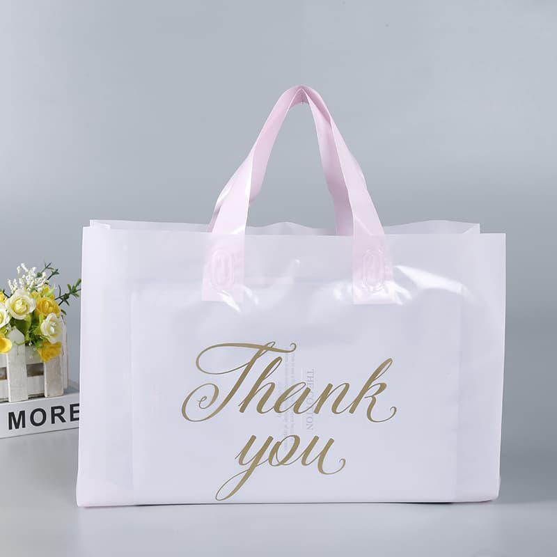 Manufacturer Stock PE Children's Clothing Hand Plastic Bag Women's Clothing Packaging Bag Clothing Store Bag Logo Milk Tea Cup
