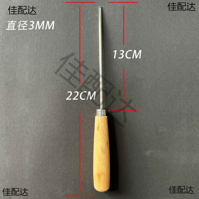 Handheld stuffing stick with handle for plush doll making tools.