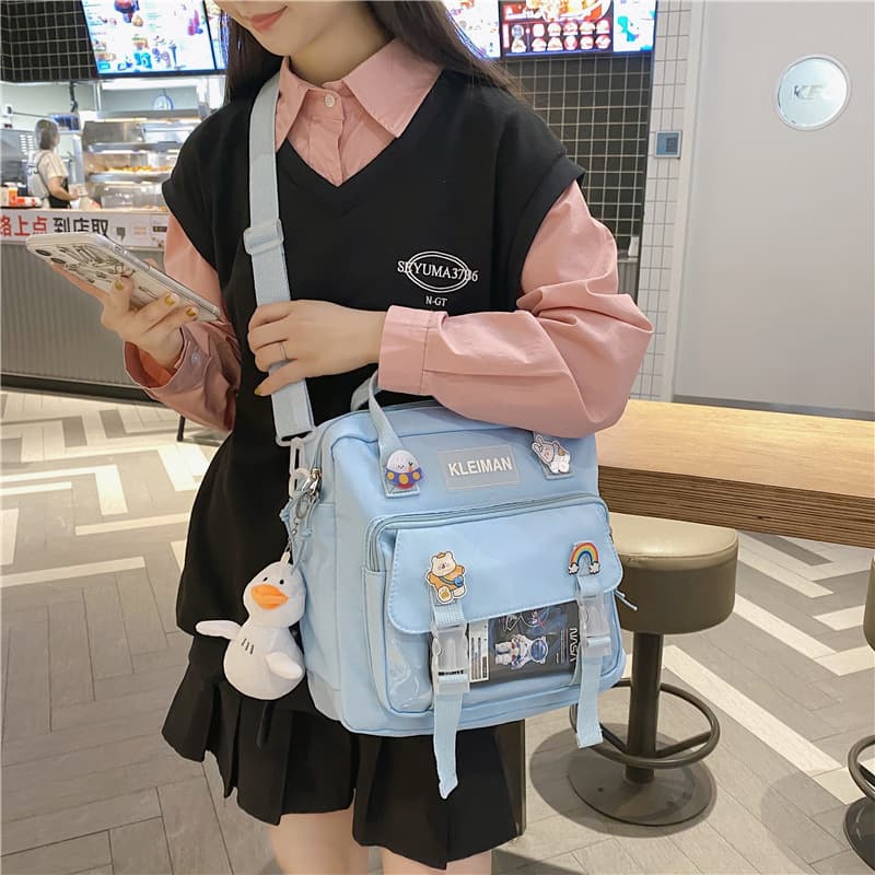 Solid color Japanese large-capacity shoulder crossbody bag female students make-up course bag portable nylon messenger bag Japanese and Korean