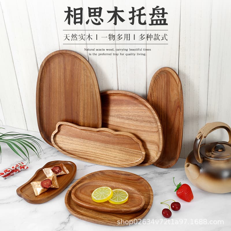 Creative solid wood acacia tray in irregular shapes for fruits, snacks, and tea-time treats.