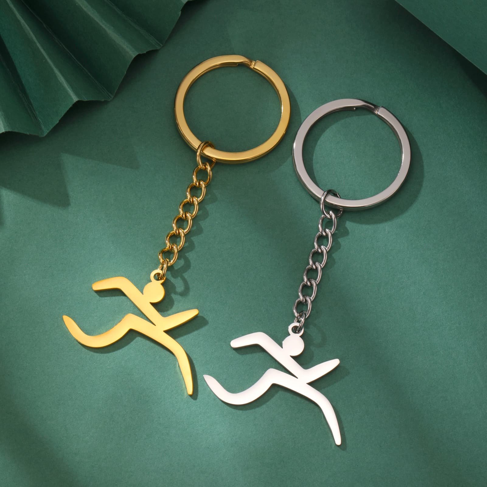 Yiwu small jewelry manufacturer direct sales fashion simple titanium steel simple drawing bicycle pendant stainless steel keychain