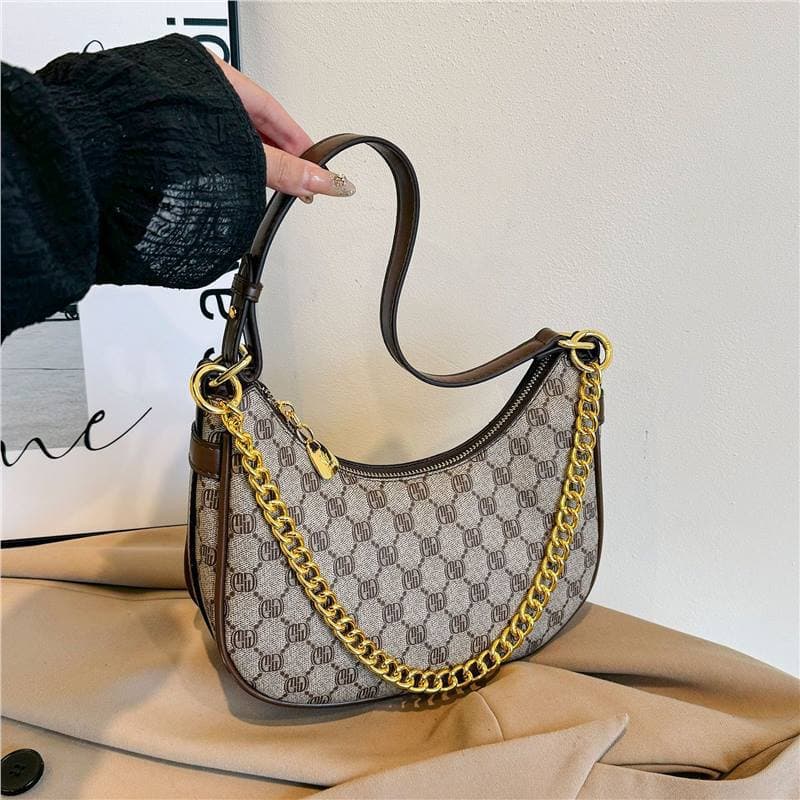 Big brand replacement new pea crescent fashion crossbody bag one-shoulder versatile printed armpit women's bag high-value women's bag