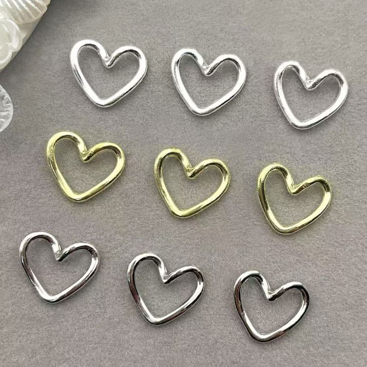 New manicure alloy three-dimensional love jewelry Japanese hollow heart-shaped nail decoration wholesale