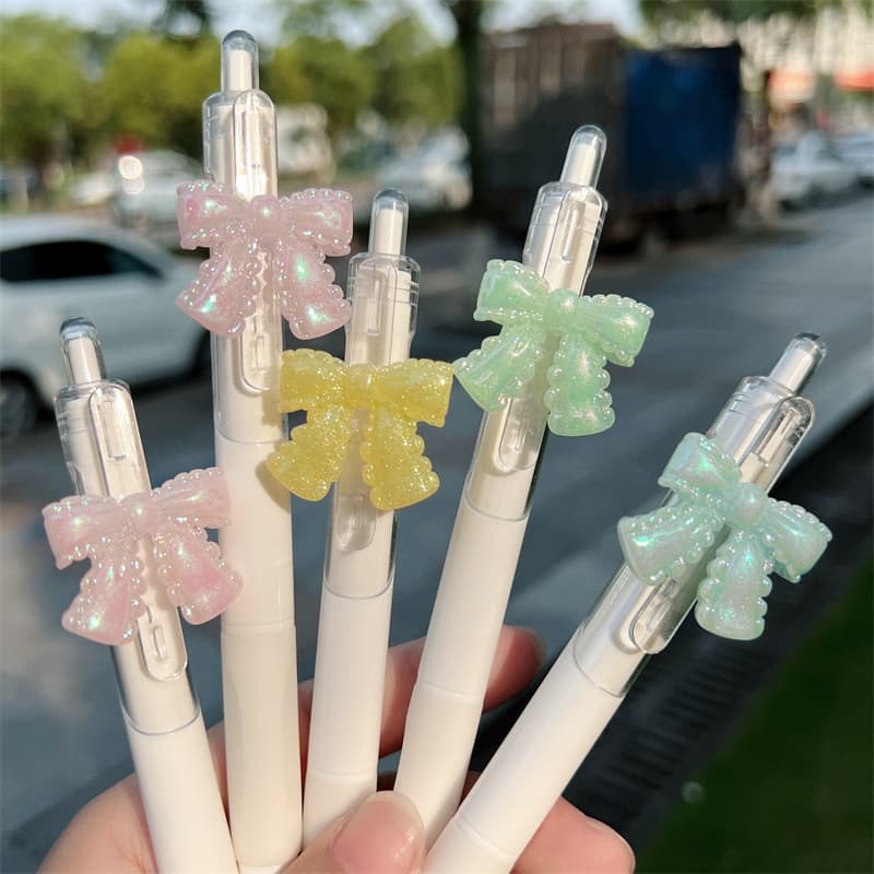 High-quality student pen with cute bowknot design, summer light-colored pendant pen, ST nib carbon pen, black, wholesale