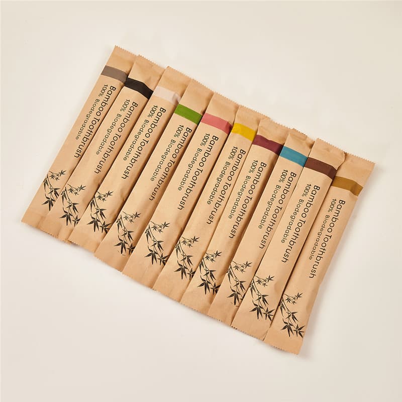 Non-disposable nylon soft bristle bamboo toothbrush for hotels, inns, and B&Bs, customizable with paper bag packaging