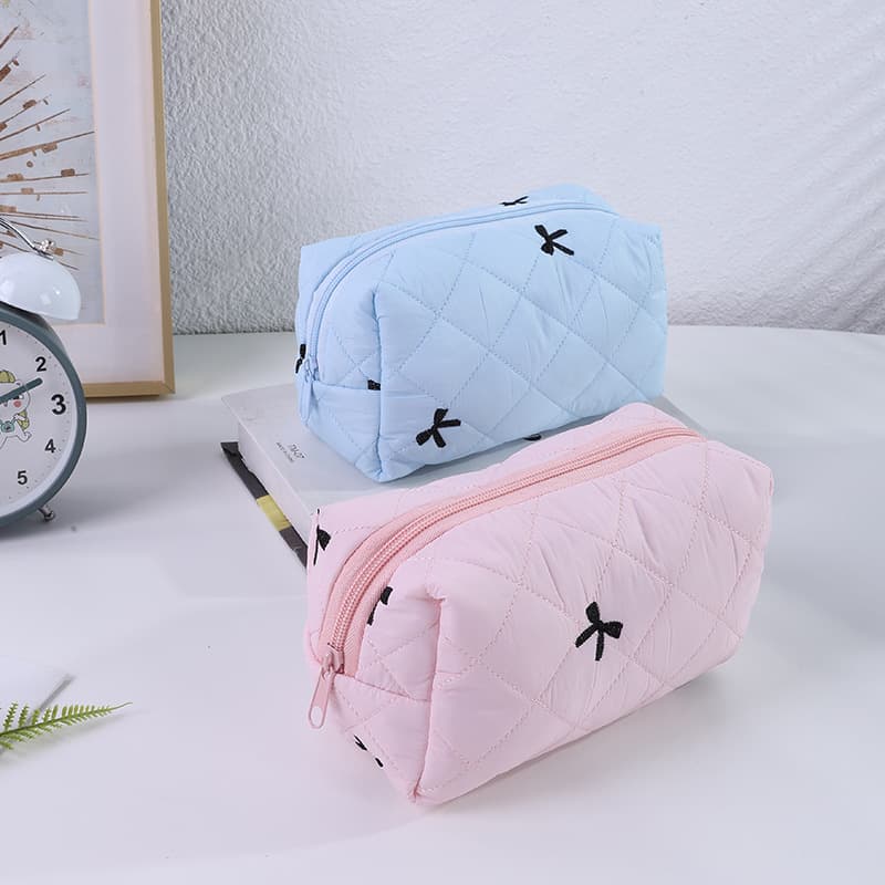 New niche cute bow pencil bag ins high-looking large-capacity student soft huhu stationery storage bag