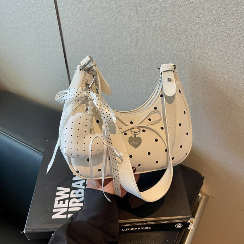 Korean style super hot polka dot handbag women's new girly heart bow commuter shoulder crossbody bag exquisite armpit bag
