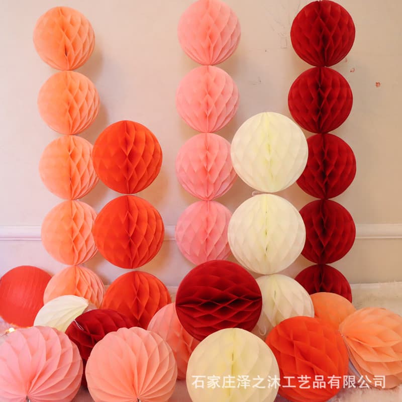 Wedding pillars, honeycomb balls, single paper lanterns, wedding room decorations, wedding bedroom backdrops, and garlands.