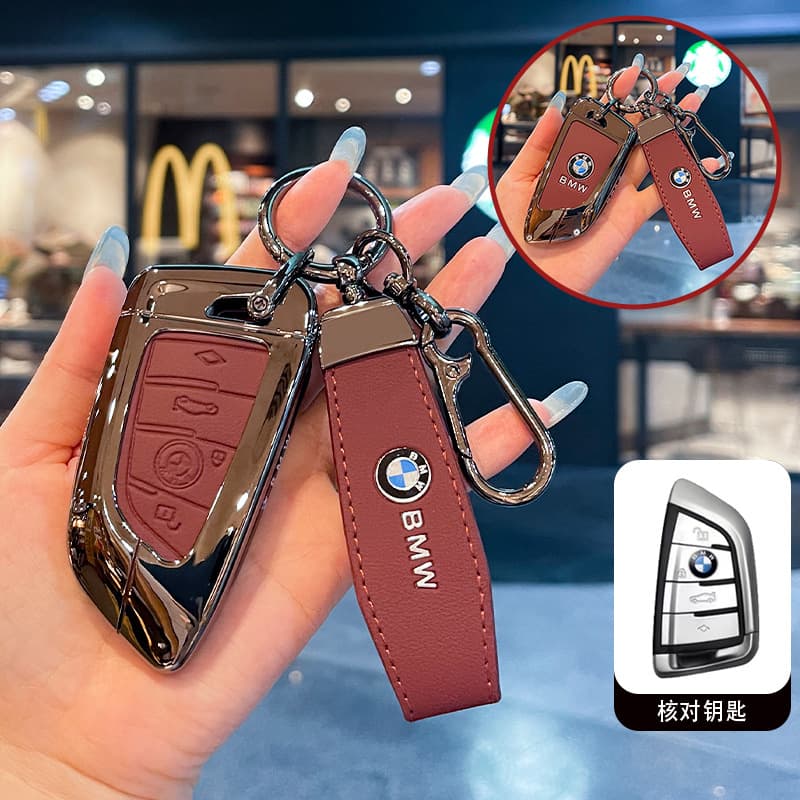 Suitable for BMW key cover 3 series 318i five 5 series 528 three X1X3X5X6X7i3Z4 7 series 730 car bag buckle shell