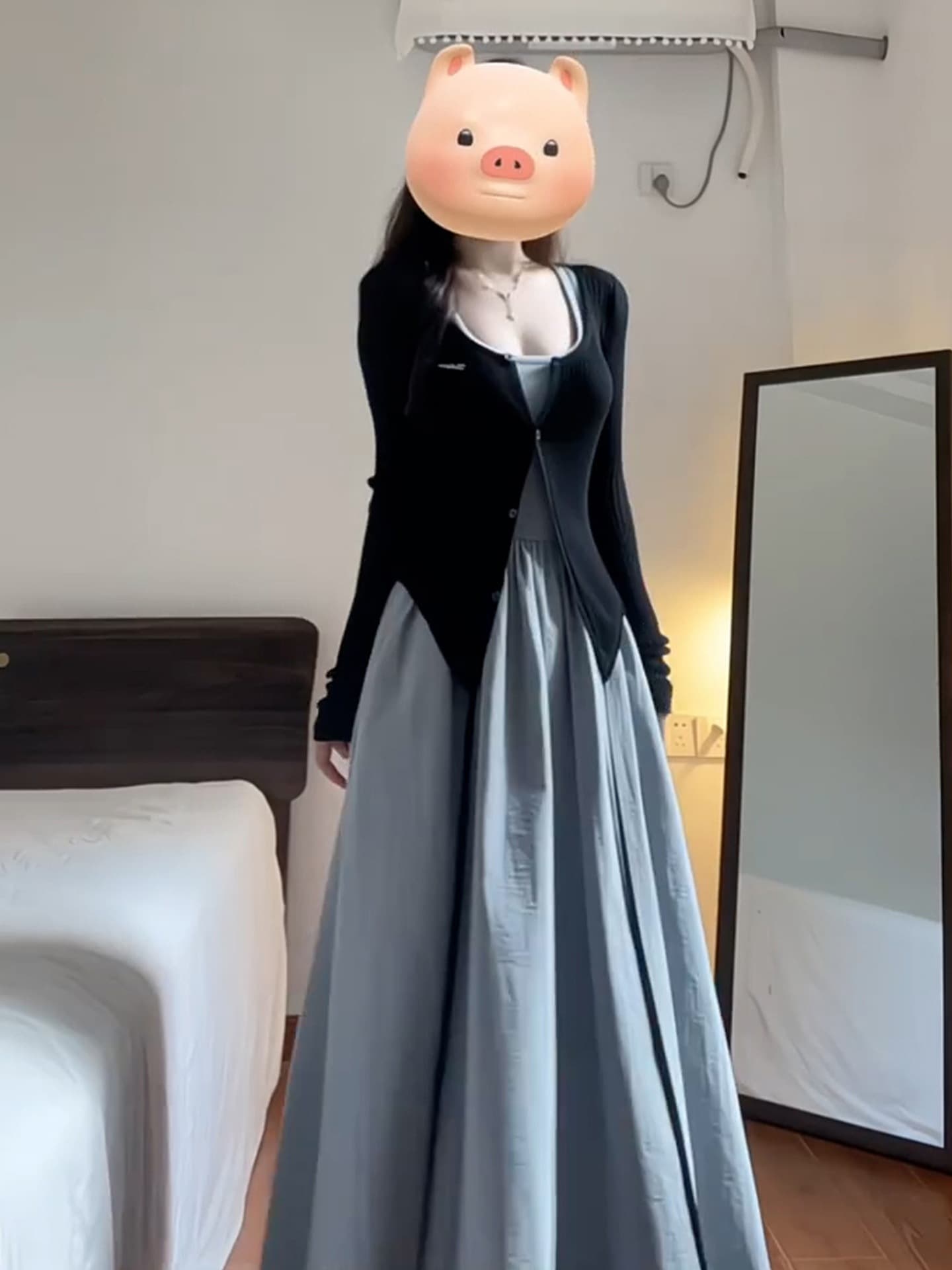 French suspender dress for women in autumn and winter 2026 new hot style temperament waist huge good-looking early autumn long skirt suit