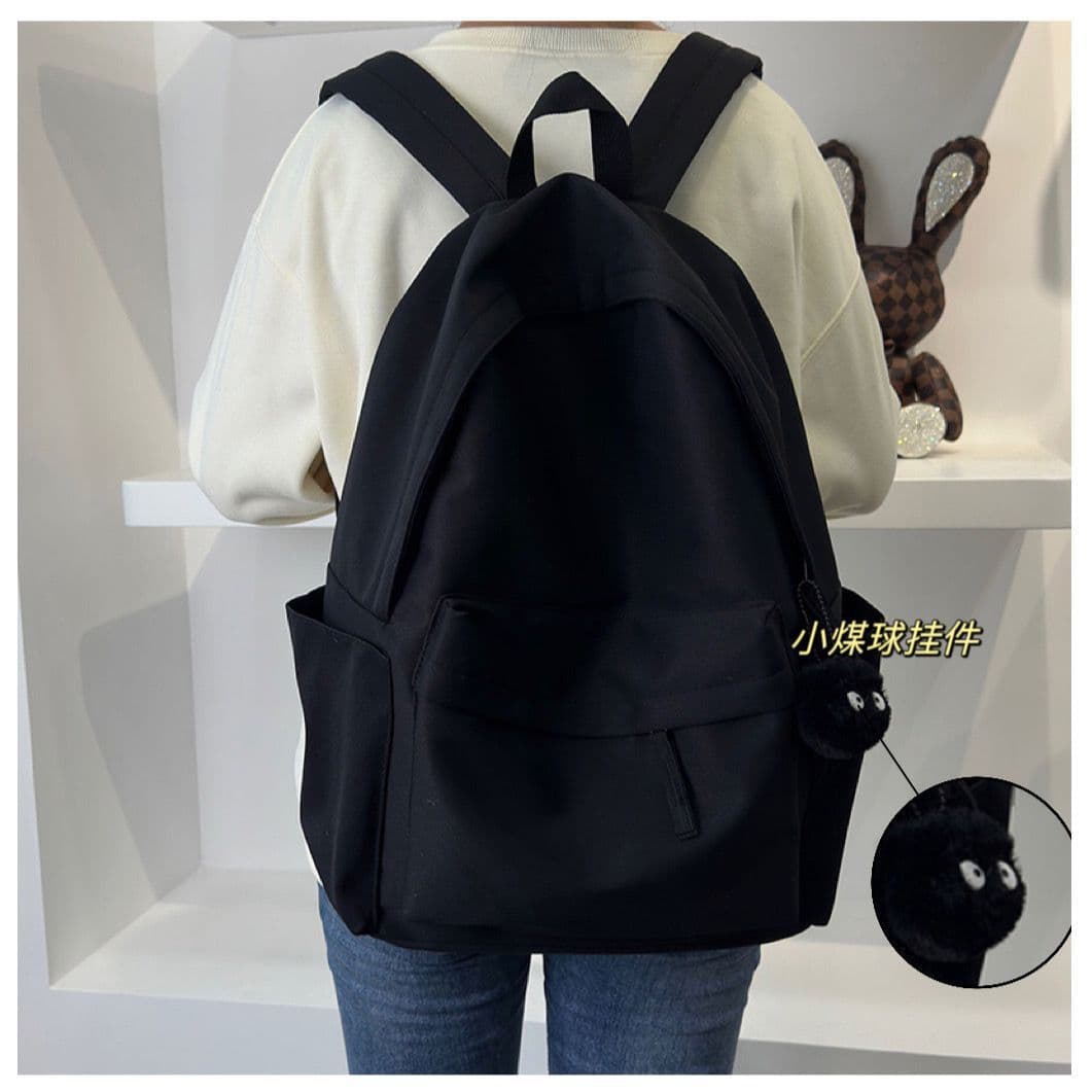 Korean version ins simple solid color backpack women's large capacity school bag junior high school and high school student backpack men's versatile casual