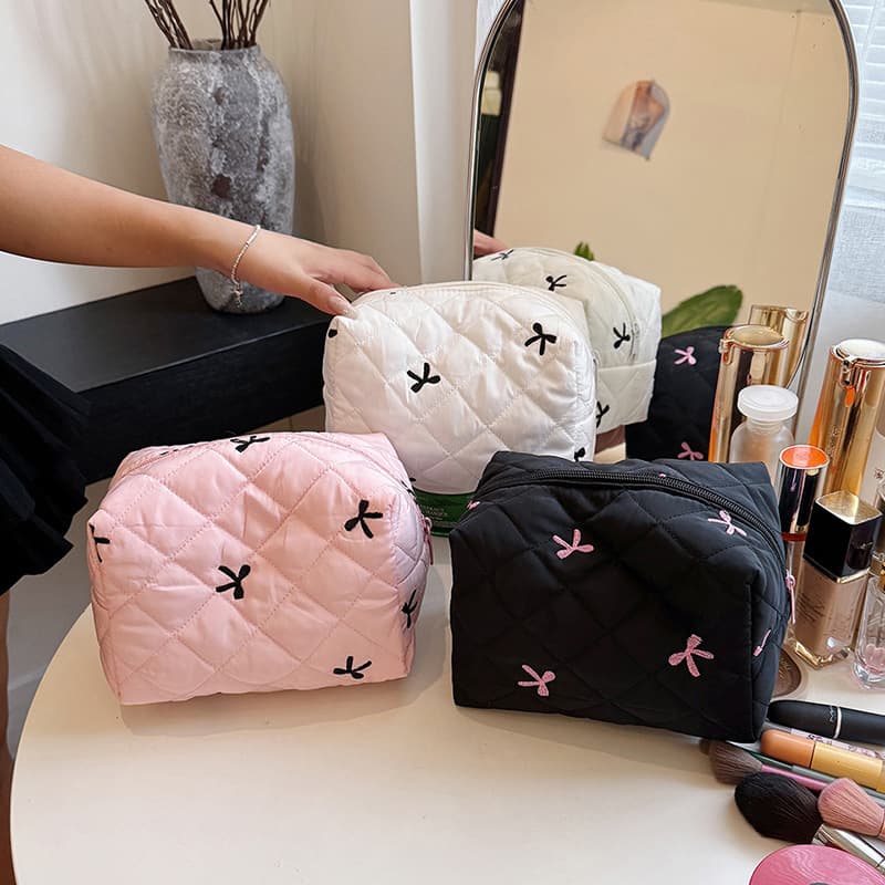 2024 New Butterfly Knot Handheld Large Capacity Cosmetic Bag International Station Toiletry Bag Portable Storage Bag for Men And Women