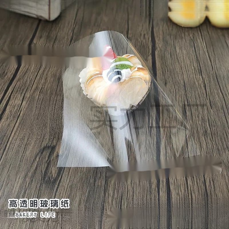 Cake wrappers, single-layer bread display cases, plastic transparent island display cases, packaging paper, cellophane, food display cases, strawberry bouquets, baking.