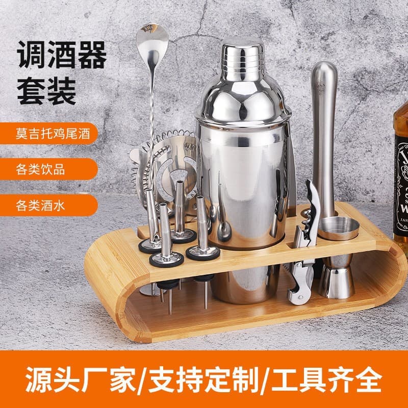 Stainless steel shaker set, 12-piece bar set with wooden stand and base for cocktail mixing.