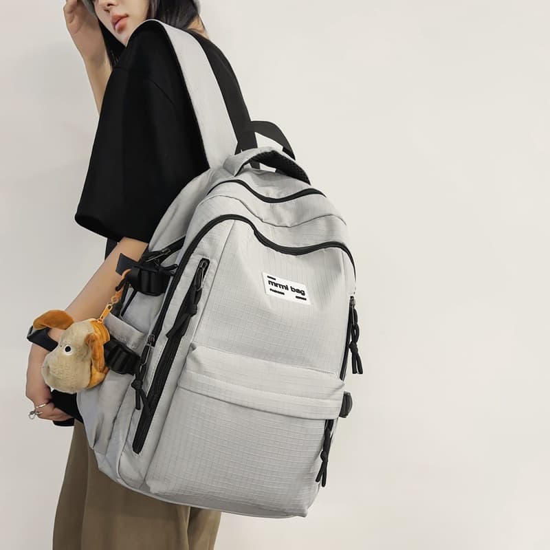 Large-capacity backpack men's waterproof travel backpack simple solid color junior high school student high school student college student bag