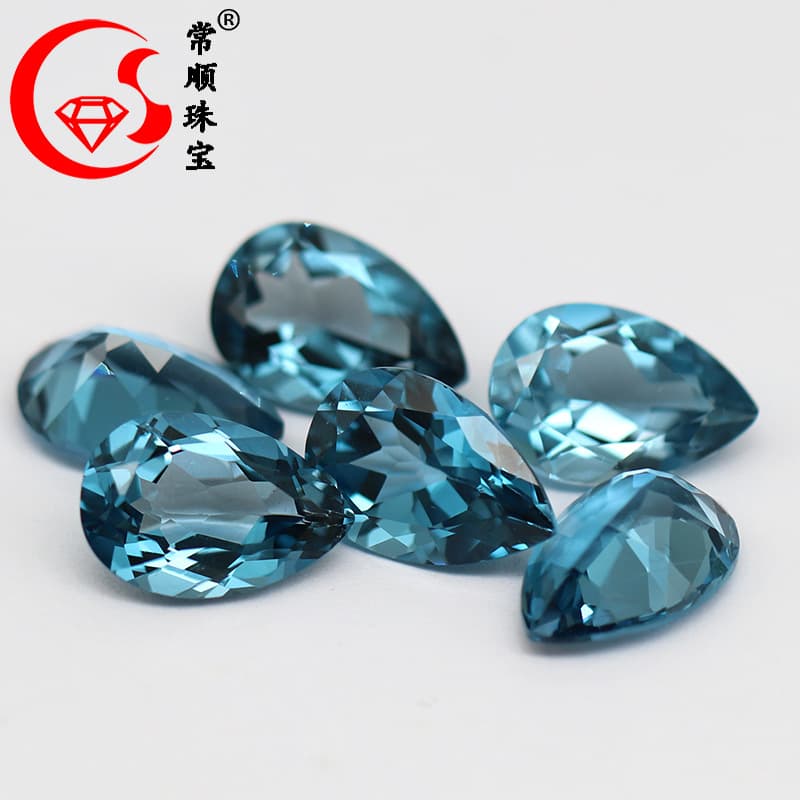 Factory Direct High Quality Natural London Blue Topaz Teardrop Pear Shape Cabochon, Clean Without Fractures, Suitable for Gold Setting