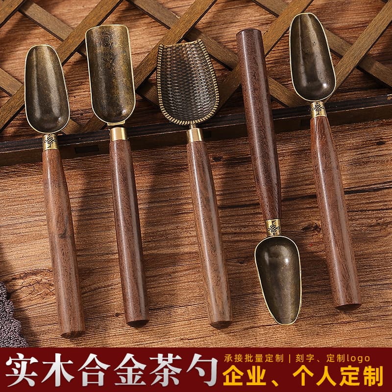 Factory direct wholesale of ebony alloy tea spoons, tea scoops, tea shovels, tea ladles, Kung Fu tea sets, and tea ceremony accessories. In stock.