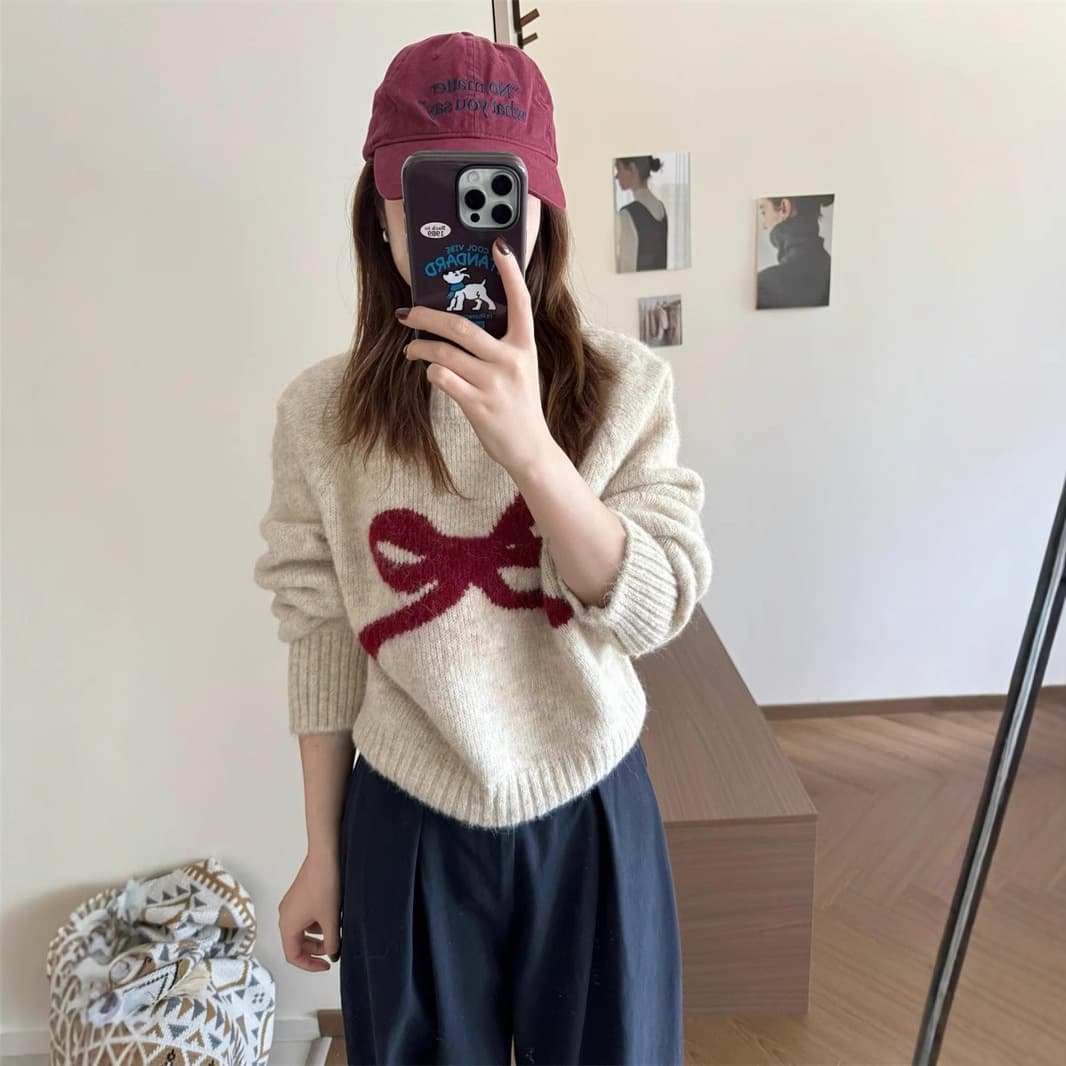 Korean style sweet age-reducing bow round neck long-sleeved sweater for women spring and autumn Japanese style soft and waxy outer sweater top