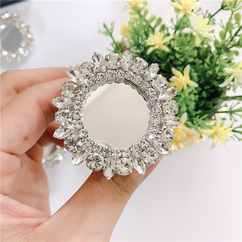 Japanese and Korean ins super hot diamond-encrusted mobile phone holder universal gemstone crystal support telescopic mirror lazy sticky style women