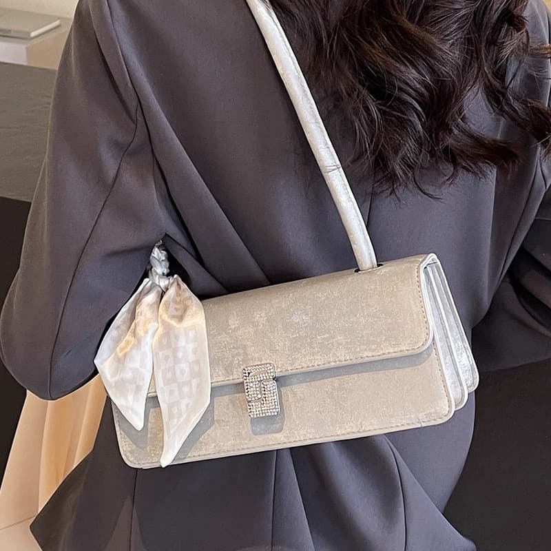 High-End Stylish Silver Bag for Women 2026 New French Niche Style Shoulder Underarm Bag Fashionable Handbag Baguette Bag