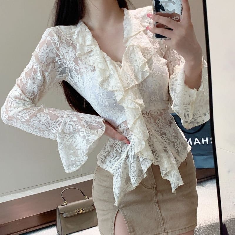 Solid color V-neck hollow long-sleeved shirt for women 2026 autumn new design niche fashion pure desire chic top