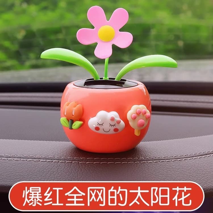 Internet celebrity car interior decoration creative cute solar bobblehead car car decoration sunflower girl